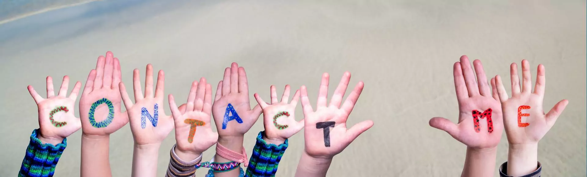 A human hand reaching forward or upward with the words Contact Me